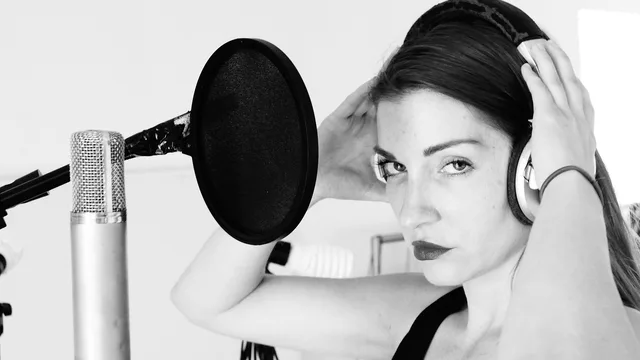 singer, musician, woman, headphones, girl, singing, microphone, recording, sound studio, singer, singer, singer, singer, singer, singing. Turning a voiceover content plan into a month-long production sequence