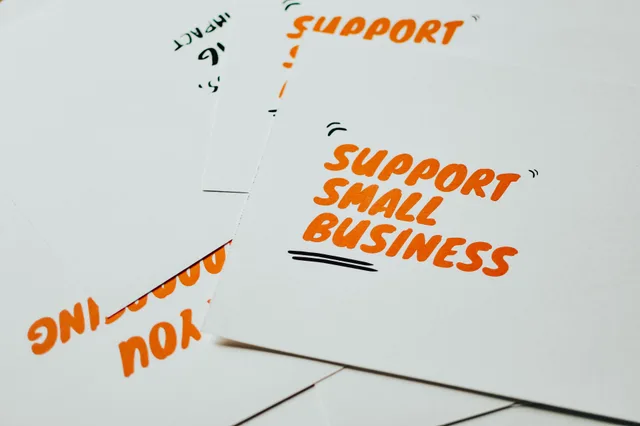 Close-up of motivational cards promoting support for small business on white background. Voiceover Startup: How Rates and Usage Rights Work