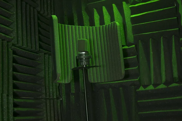 microphone, mic, music equipment, recording booth, studio, lighting, green, green music, green microphone, recording booth, recording booth, recording booth, recording booth, recording booth. Voiceover Studio Rental Insurance: Clauses to Check